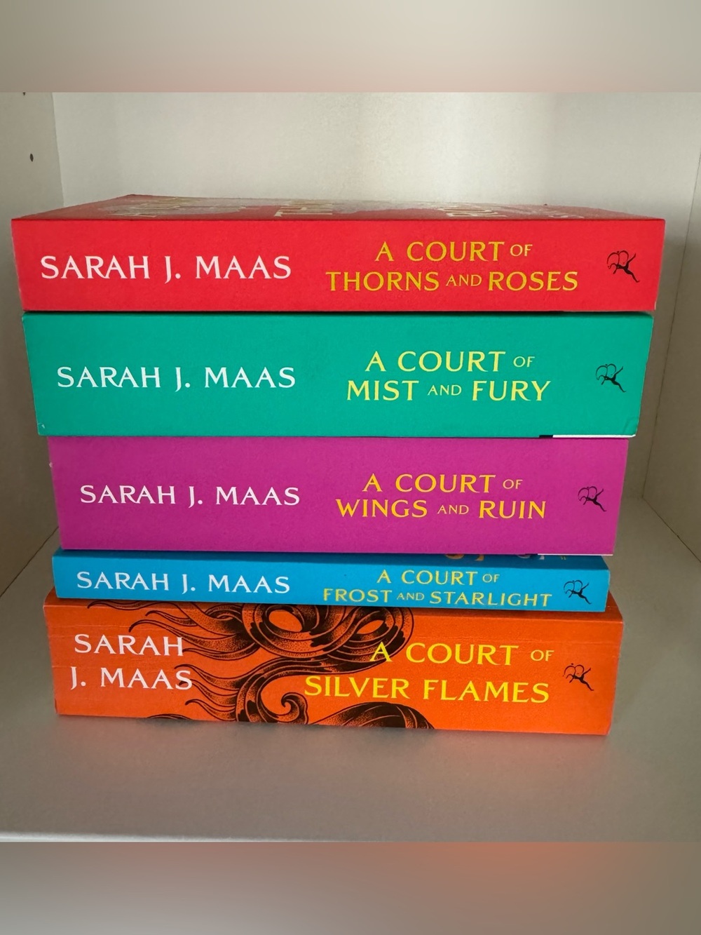 A Court of Thorns and Roses series by Sarah J. Maas